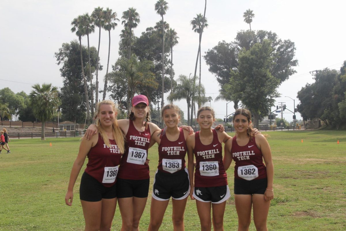 On+Sept.+22%2C+2023%2C+Foothill+Technology+High+School+%28Foothill+Tech%29+competed+in+their+first+Tri-County+Athletic+%28TCAA%29+league+meet.+Foothill+Tech+races+with+five+girls+on+varsity%2C+including+Danika+Swanson-Rico+25%2C+Bennett+Rodman+26%2C+Kalea+Eggertsen+26%2C+Emma+Anderson+26+and+Isabella+Efner+25.+They+warm-up+on+the+start+line%2C+exchanging+words+of+encouragement+and+waiting+for+the+queue+to+begin+the+race.