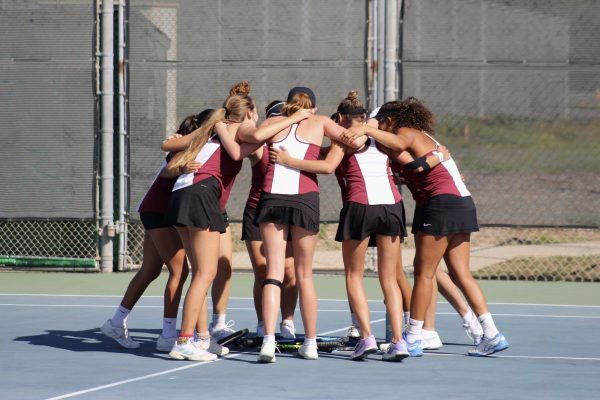 On the sunny afternoon of Sept. 19, 2023 girls tennis played against the Villanova Preparatory (Villanova) School Wildcats. The tennis team huddles together and chants in a pregame ritual before beginning their matches.