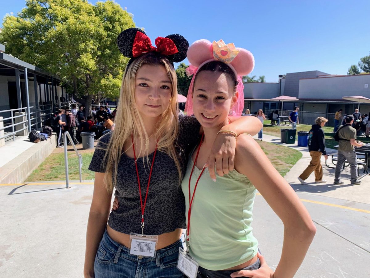 Celebrating Foothill Technology High Schools (Foothill Tech) first spirit week of the 2023-24 school year, Eva Goncalves 25 and Miranda Aguilar 25 wore Mickey and Minnie Mouse ears because the theme was dynamic duos.