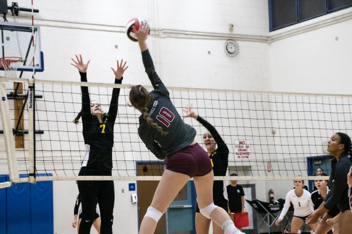 Ashlyn Mullin 24 (number 10) spiked the ball over the net, watching as it soared above the head of her opponent. Mullins impressive front row spikes, along with her back row digs and hits, proved that she was an all-around impressive player and a vital member of the girls volleyball team.