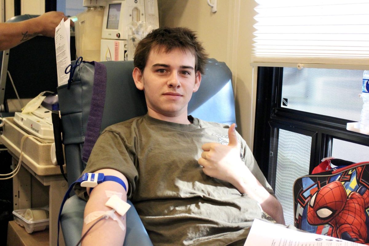 Beckett Smith ‘24, one of the first donors of the day, waits calmly and patiently as the Vitalant practitioners draw blood, which on average takes about 10 minutes. Like all donors, Smith had to go through a medical screening before he could give blood. This includes, but is not limited to, your blood pressure, temperature and pulse.