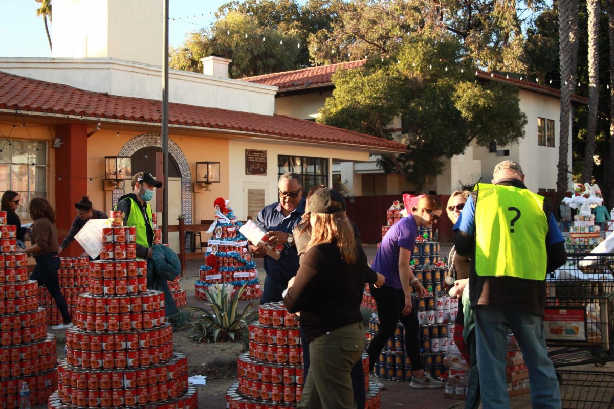 Continuing their annual tradition, Food Share of Ventura County organized their holiday can-tree drive to support the struggling members of the community. Joining together to make a difference, members of the Ventura community gather in front of the Ventura Mission downtown to build can trees out of hundreds of donated cans. With free creative liberty, organizations from all over the city decorated their trees with different fun themes. All of the cans used for the trees were then donated to Food Share and distributed to over 267,000 Ventura County residents who are in need of extra food during the holiday season.