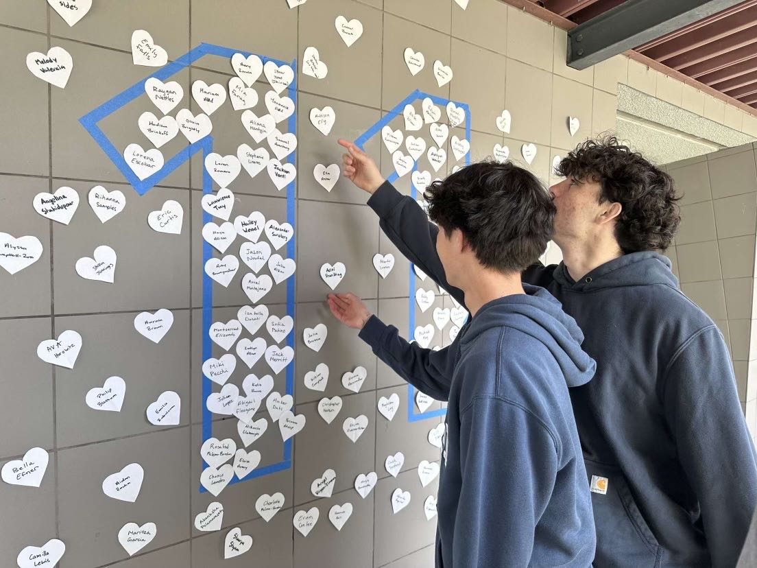 In a week full of kindness, Ian Clayton 25 and Spencer Jones 25 locate their names among those of their classmates posted outside of Foothill Tech’s black box. Throughout the week, ASB set up events such as writing positive statements on clips and encouraging students to clip them onto someone random to share kindness. Foothill Techs ASB also cut out paper hearts, wrote every students name and taped it around campus grouped by grade level.
