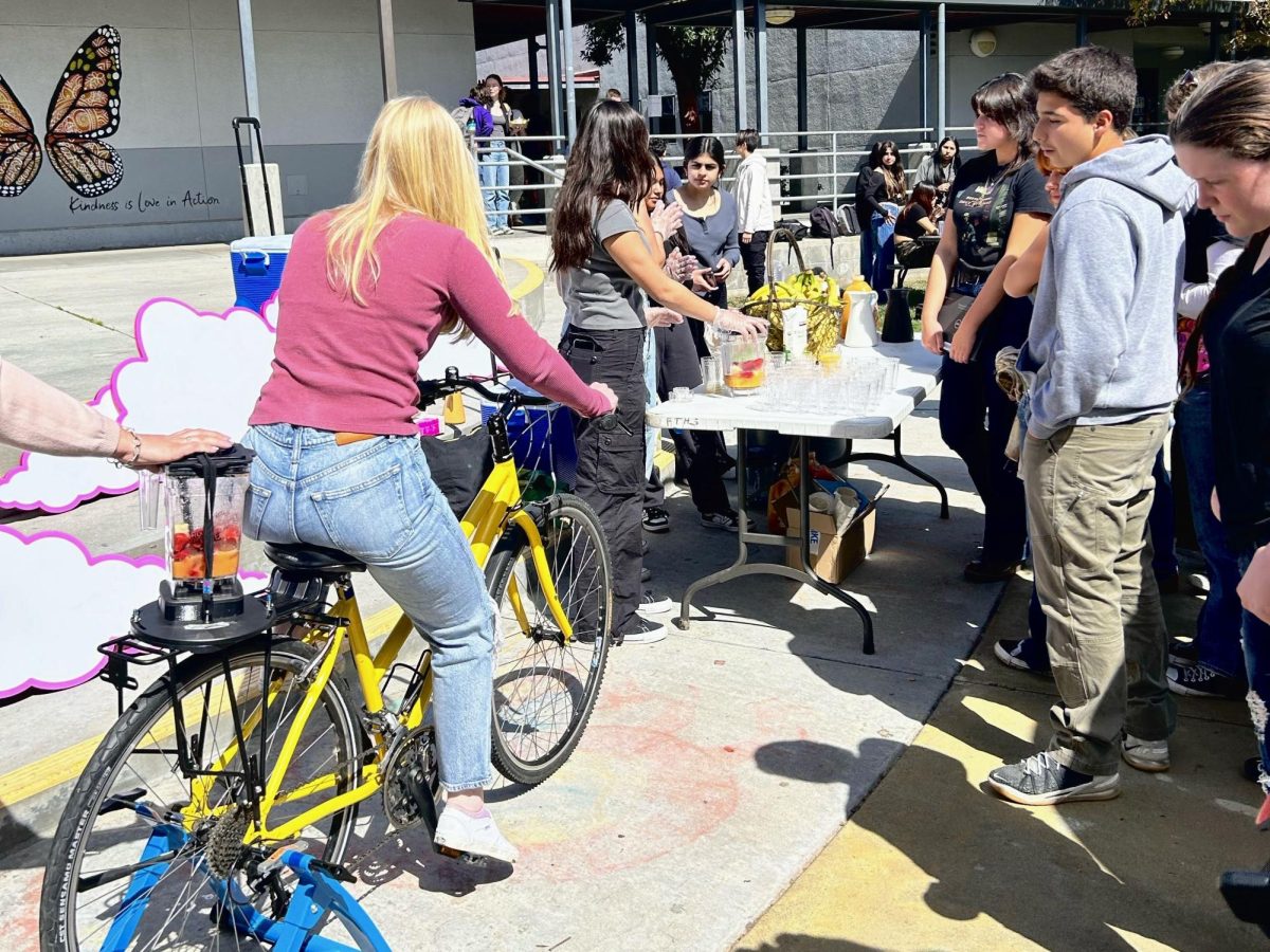 Foothill Tech students took the opportunity to blend their own smoothie using power generated by pedaling a bicycle. The smoothie bike drew a crowd of onlookers, many of whom were waiting for their chance to make a delicious smoothie. 