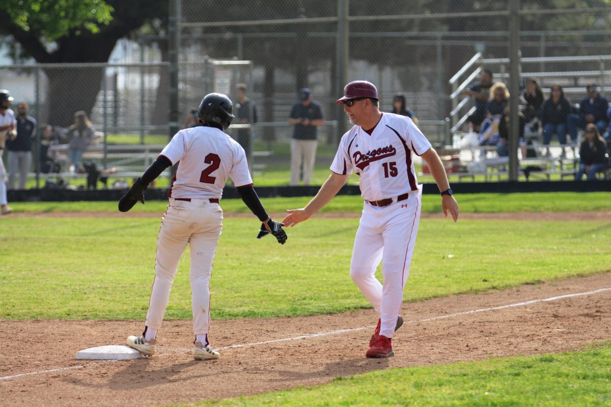 With+the+season+at+stake+for+Foothill+Technology+High+School+%28Foothill+Tech%29%2C+Aidan+Gomez+25+puts+pressure+on+his+opponent+leading+up+to+the+final+innings+of+the+game.+Resulting+in+multiple+stolen+bases+and+home+for+Gomez%2C+he+helped+his+team+and+kept+the+dragons+in+the+game.
