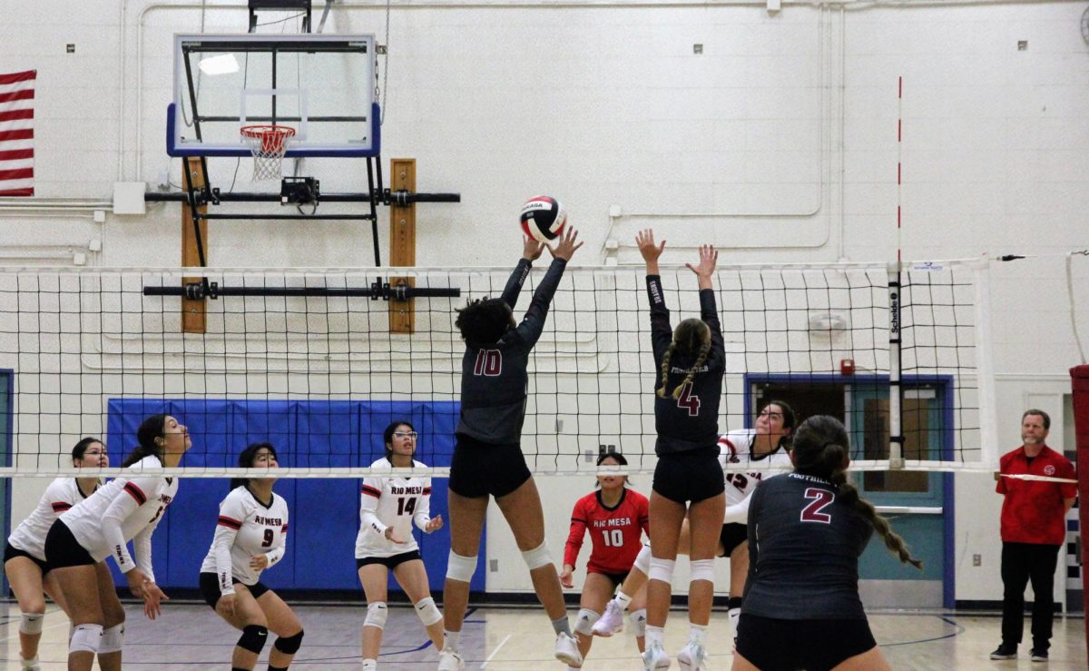 On Aug. 22, 2024, Foothill Technology High School (Foothill Tech) faced off against Rio Mesa High School (Rio Mesa) in their first home game of the year. Maya Adams '28 (number 10) blocks a spike from the Spartans. Although only a freshman, she has contributed to the Dragons on both offense and defense.