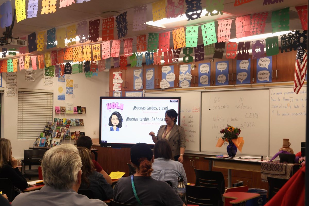 During the evening of Sept. 19, 2024, Norma Garcia joined her fellow teachers for Back to School Night. This Spanish teacher welcomed parents into her classroom and discussed the importance of language learning. She highlighted her expectations for students and shared numerous resources to support their academics. Parents appreciated her insights and the welcoming atmosphere of her classroom.