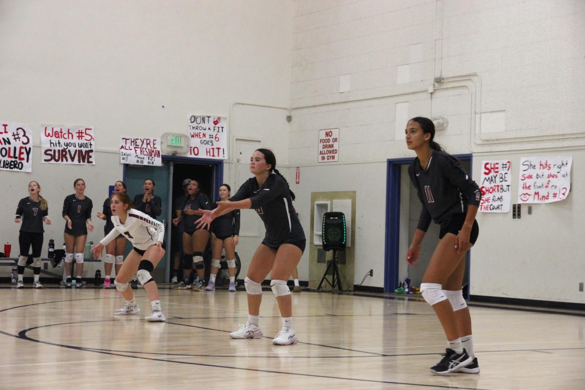 Aliana Hantgin '25 (number 3), Lilac Reyes '26 (number 6) and Leilani Wallace '28 (number 11) prepare to pass the ball during the intense  match against Bishop Garcia Diego High School (Bishop Diego) that took place on Sept. 24, 2024. Each player was ready with determination to help their team attempt to come back.