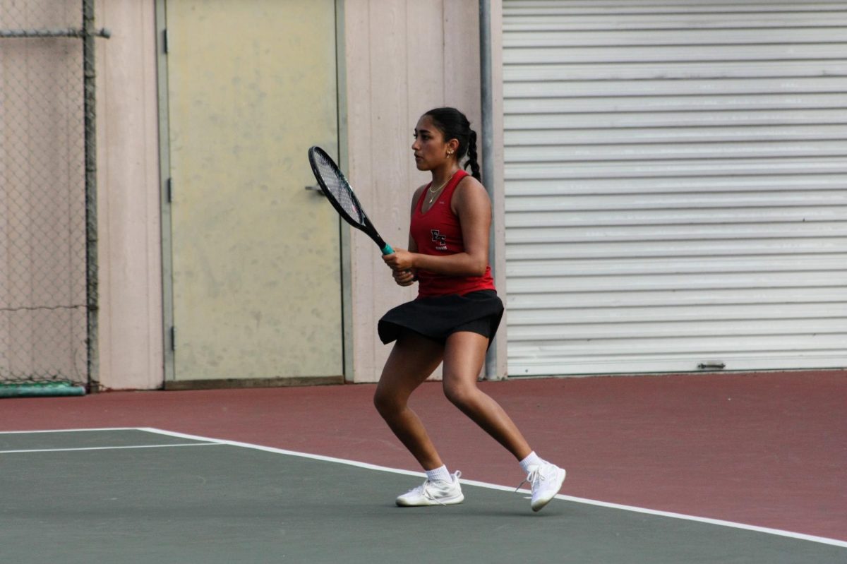 Saanvi Joshi '26 focuses on the ball in preparation to return the serve to her opponent. Although she lost her first and third match, she ended up winning her second.