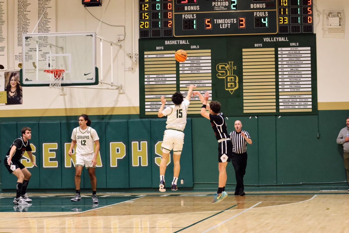 Third year Foothill Technology high school (Foothill Tech) varsity boys basketball player Nick Turner ‘26 shoots a three-pointer and scores to help his team catch up in this rapid game against Saint Bonaventure High School (Bonnie) that took place on Dec. 2, 2024, at Bonnie.