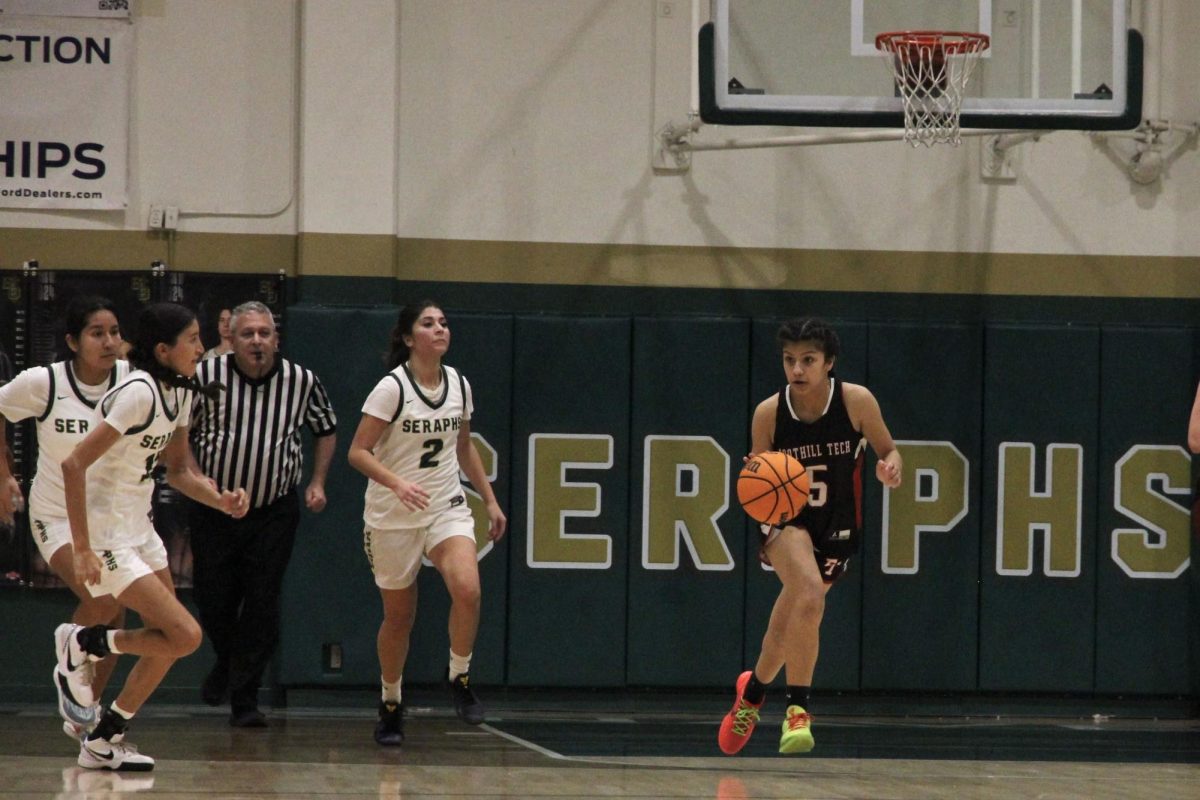 On Dec. 16, 2024, the Foothill Technology High School (Foothill Tech) girls basketball team competed in a league match against St. Bonaventure High School, (Bonnie) and lost 47-76. Kiara Zavala ‘26 (number 5) runs the ball up the court starting an offensive play with hopes of catching up to St. Bonnie.