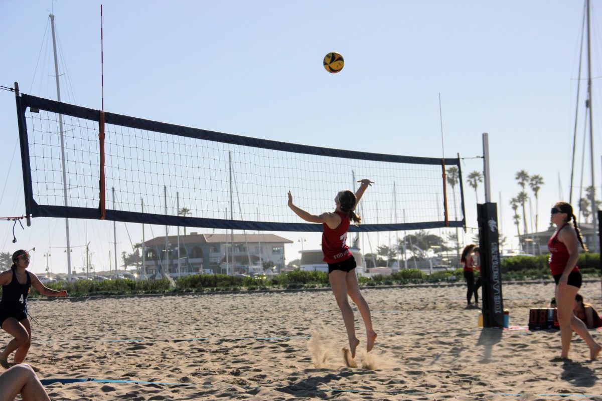 On Feb. 25, 2025 the Foothill Teconolgy High School (Foothill Tech) girls beach volleyball team faced off against Santa Clara High School (Santa Clara). The match took place at the beach volleyball courts located inside the Ventura Harbor, and was an easy win for the Dragons with a final score of 5-0. Pictured here is Samantha Jacobson '26 jumping up to the next to spike the ball over to secure the extra point for her team.