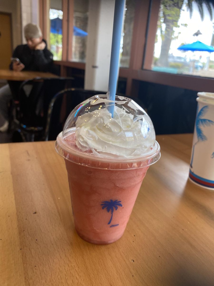 The tangy Strawberry Banana Smoothie is a thick and refreshing drink. With an optional whipped cream topping, it has a pleasantly dominant strawberry flavor with hints of banana in every sip.
