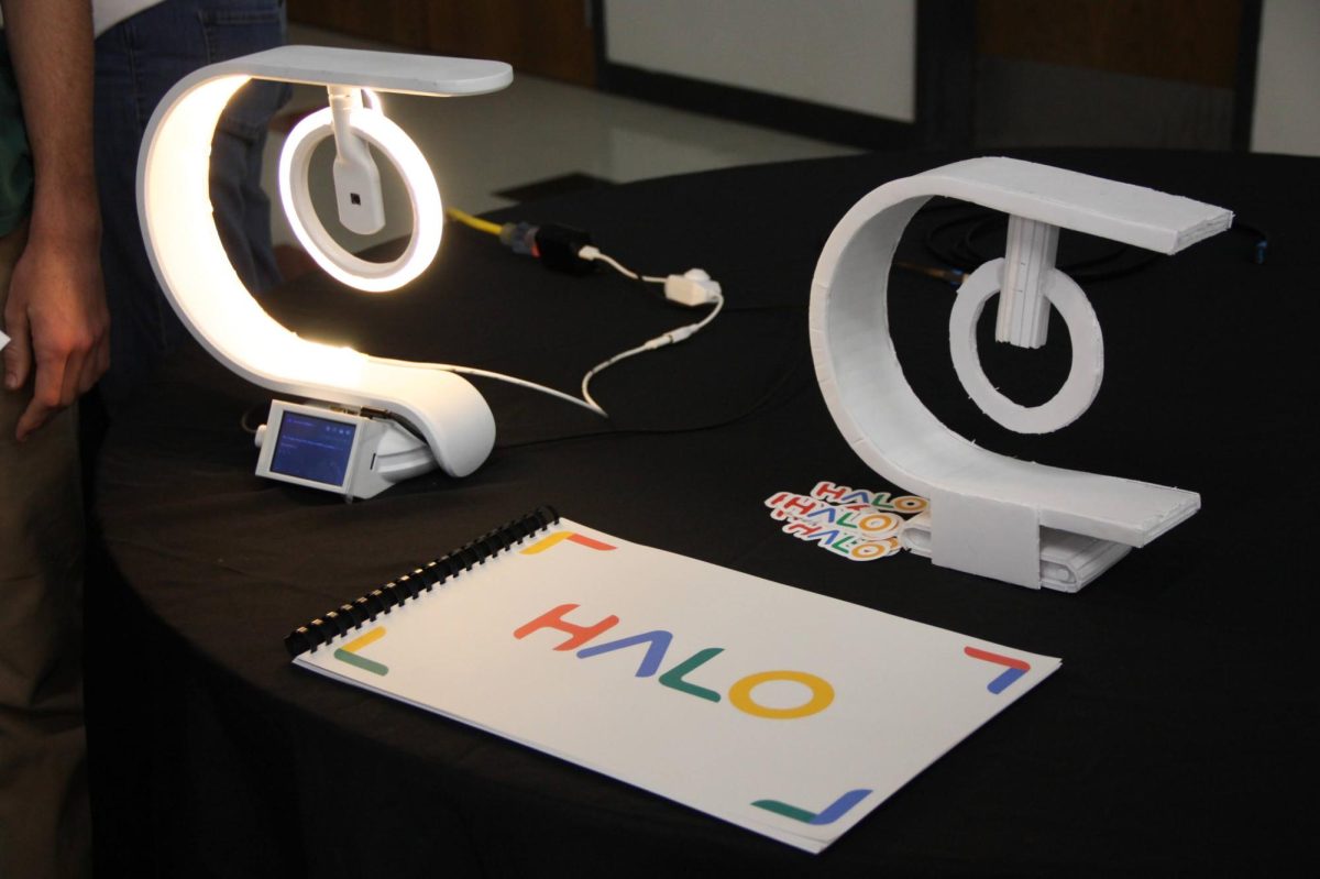 On May 9, 2025, DTech Academy Capstone (DTech) Dynasty seven students gathered in Spirito Hall to  pitch their final projects. These projects included a process book, foam model, stickers, branded shirts and a prototype of a lamp that was emulated into the likeness of a preexisting brand. Above is Brandon Wofford's '25 emulation of "Google" into his lamp under the name "Halo."