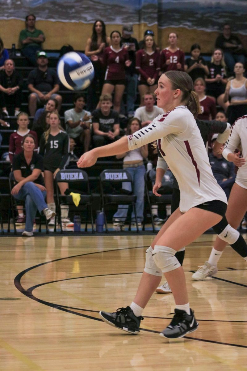 After a spike from one of Buena High School’s (Buena) hitters, Samantha Jacobson ‘26 (number 1) passes the ball from the back row to the setter, hoping to set up a successful play. Jacobson’s determination was shown throughout the game as she was running to save the ball no matter where it was hit.
