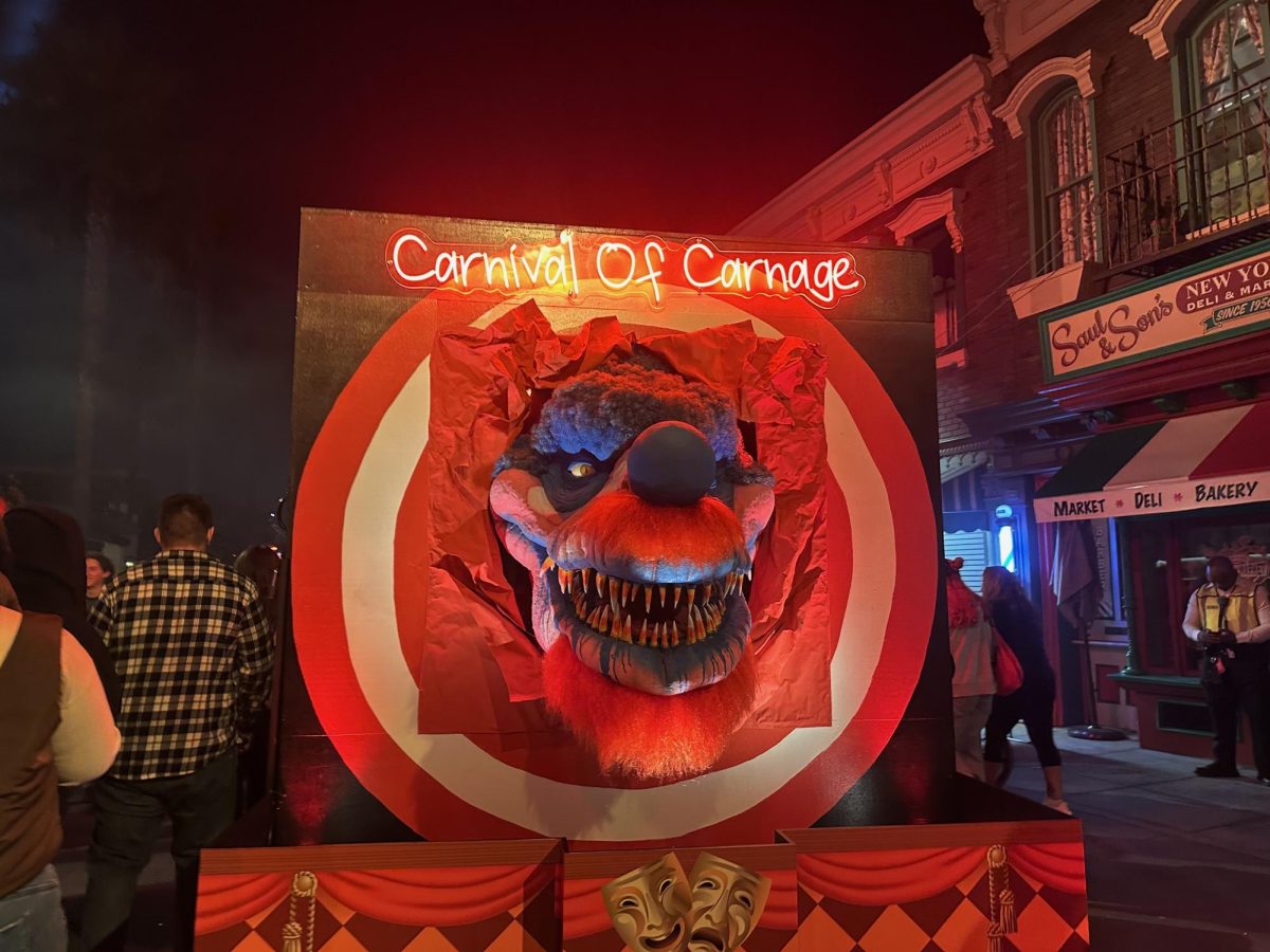 Scattered throughout the Universal Studios park are four scare zones: areas where guests can walk by scare actors and small set pieces or props. Located near the front of the park is the Carnival of Carnage scare zone, themed around clowns and the carnival. Actors were dressed in clown outfits with chainsaws, giant hammers and creepy makeup as they jumped out at guests.