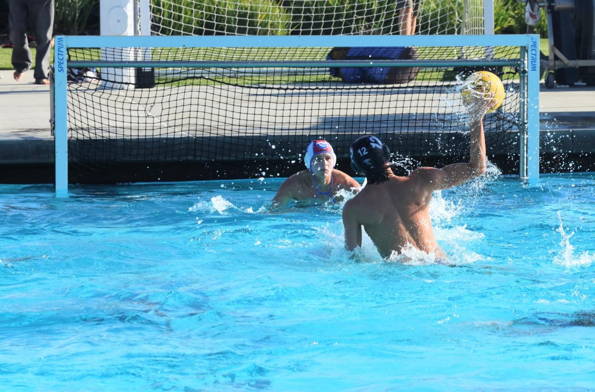 On the afternoon of Oct. 2, 2025, the Foothill Technology High School (Foothill Tech) Dragons faced off against Cate School (Cate) Rams at the Ventura Aquatic Center in an intense game with both sides showing tremendous effort, eventually ending in a 14-3 loss for the Dragons. Pictured is Connor Morris '27 (number 2) trying to score on Cate's strong defense. Morris proved to be a valuable member of the team, showing consistent effort throughout his first game of the season after coming back from a shoulder injury.