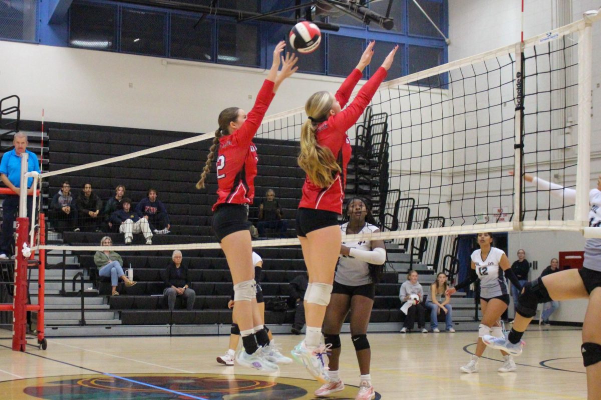 On the night of Oct. 20, Foothill Technology High School (Foothill Tech) Volleyball team kicked off their first round of CIF against University Preparatory High School (University Prep). Making a quick decision to block the ball, Addison Hickey ‘28 (Number 8) and Janelle Nelson ‘28 (Number 12) were successful in stopping the ball's momentum. They both were able to secure many blocks and attacks throughout Foothill Tech’s match, and the Dragons ended up taking home the victory, winning 3-1.