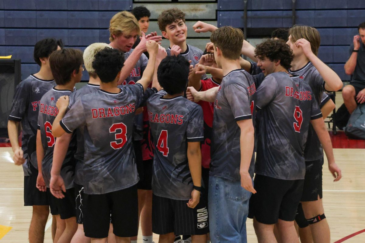 As the Dragons eagerly await the beginning of the official season, they come together to enjoy the low-pressure games of preseason. Before their first game, the team gathered for a pep talk and a group chant, signaling the commencement of their participation in the OHS Boys Volleyball Winter League Tournament.