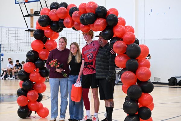 On April 13, 2026, the Foothill Technology High School boys volleyball team celebrated its senior night by crushing Laguna Blanca in a 3-0 sweep. Curren Wiggins '26 poses with his family while listening to his senior speech presented by his fellow teammates. He shared special memories from his years playing volleyball and his goals for his future.