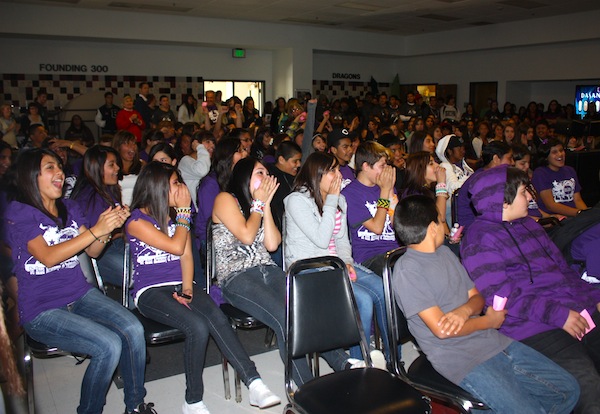 AVID middle school students laugh during an introductory presentation in Spirito Hall. Credit: Eva Morales/The Foothill Dragon Press.