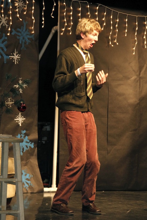 Senior Aron Egelko performs Wednesday during the Speech &amp; Debate team's second annual Merry Fest. Credit: Bethany Fankhauser/The Foothill Dragon Press.