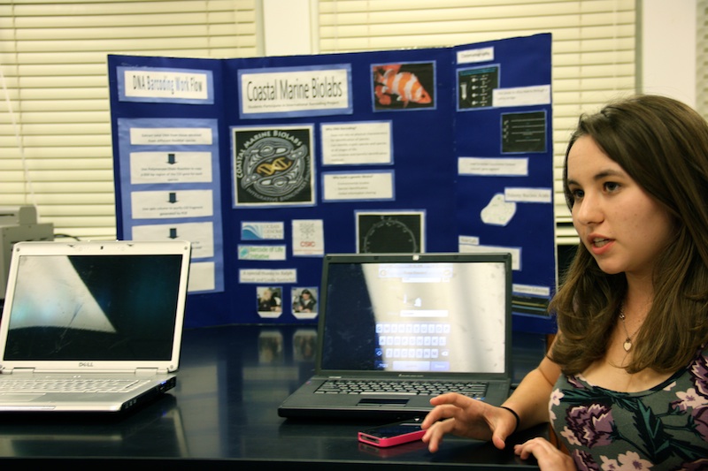 At the BioScience Fiesta, senior Averi James talked to parents about a local summer program that barcodes the DNA of marine wildlife. Credit: Kienna Kulzer/The Foothill Dragon Press.