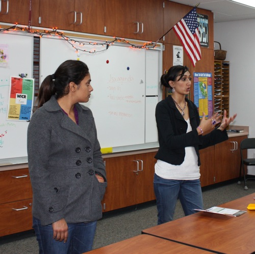 Seniors Kaval Ali and Sukhpreet Bains lead the JSA meeting. Geneva Douma/The Foothill Dragon Press.