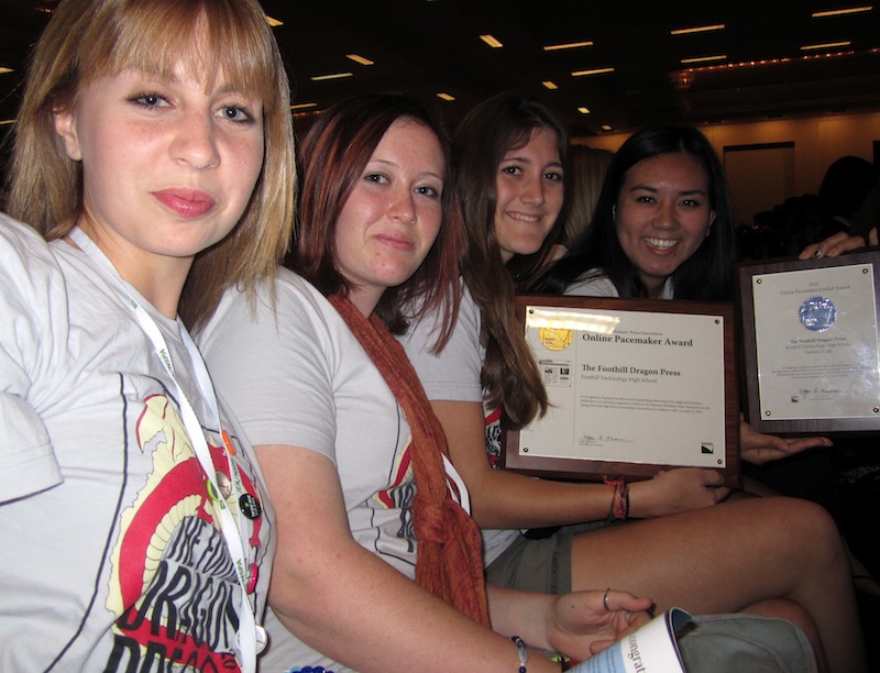 From left, Chrissy Springer, Caitlin Hurst, Lauren Parrino and Maya Morales show the Pacemaker Award, one of 18 given Saturday to the nations top high school online news sites. Credit: Melissa Wantz
