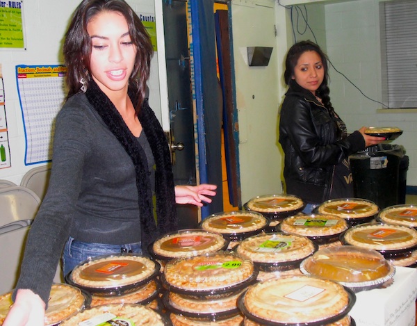 Juniors Celeste Lopez and Sandra Teran organize pies before handing them out in Thanksgiving Baskets to needy families. Credit: Eva Morales/The Foothill Dragon Press.