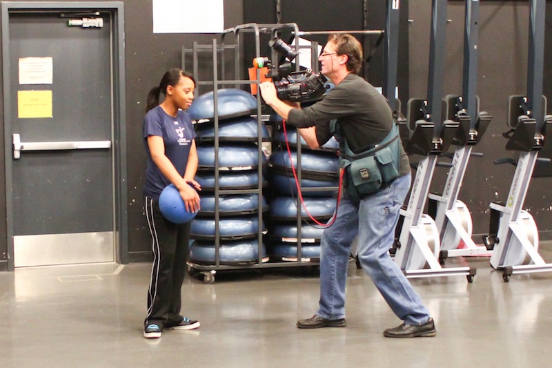 A Nickelodeon film crew takes footage of Richardson for a segment about visually impaired children. Credit: Aysen Tan/The Foothill Dragon Press