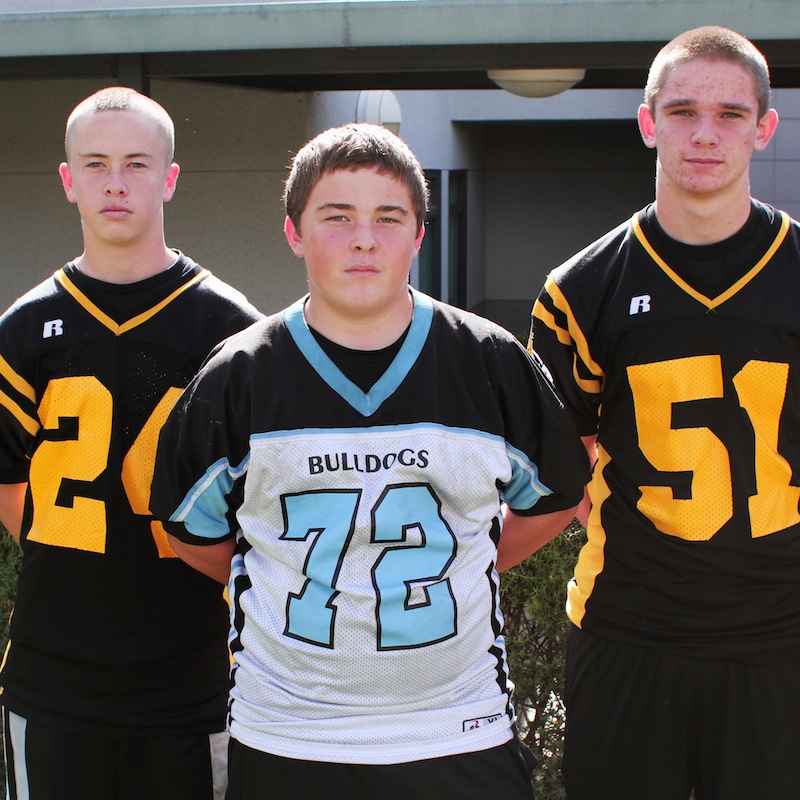 Sophomores Barry Hoffman, Nicholas OConner and Jared May play football for rival schools, Ventura and Buena. Credit: Bethany Fankhauser/The Foothill Dragon Press