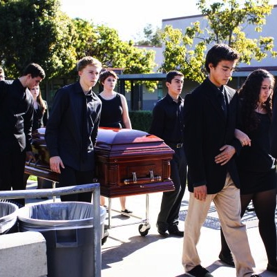 The "dead" students bring two caskets through the center of the quad to represent senior Marnie Vaughan and junior Carly Camarillo. Credit: Aysen Tan/The Foothill Dragon Press