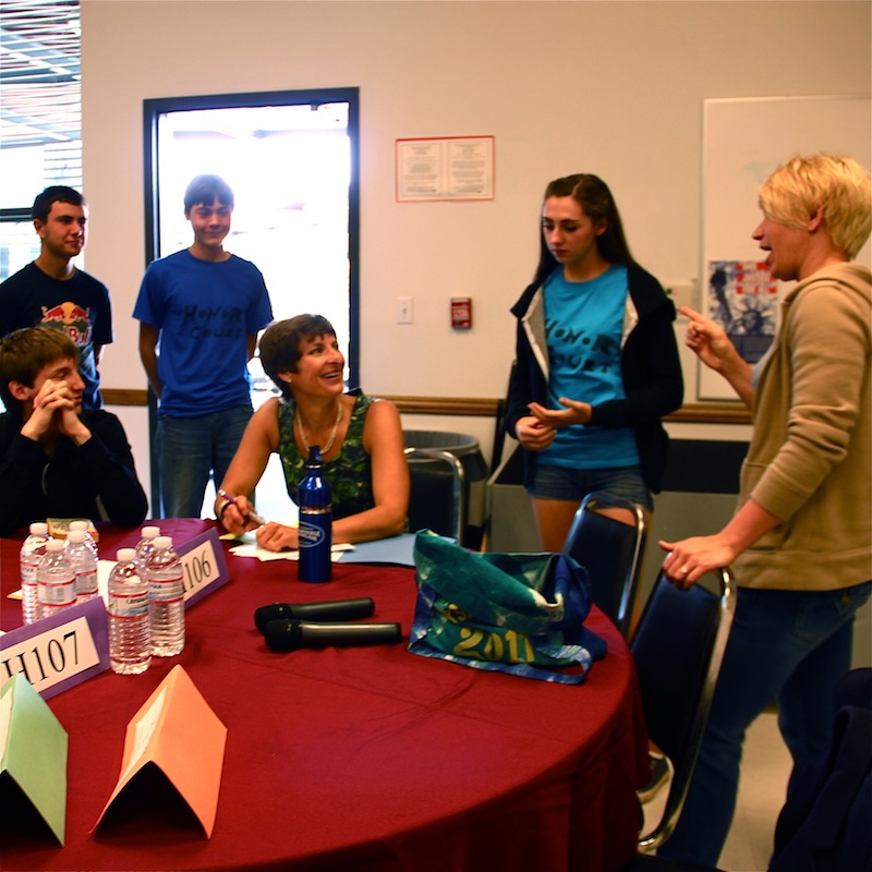 Teachers Cherie Eulau and Melanie "Captain" Lindsey organize the last Senior Hero Project. Credit: Aysen Tan/The Foothill Dragon Press