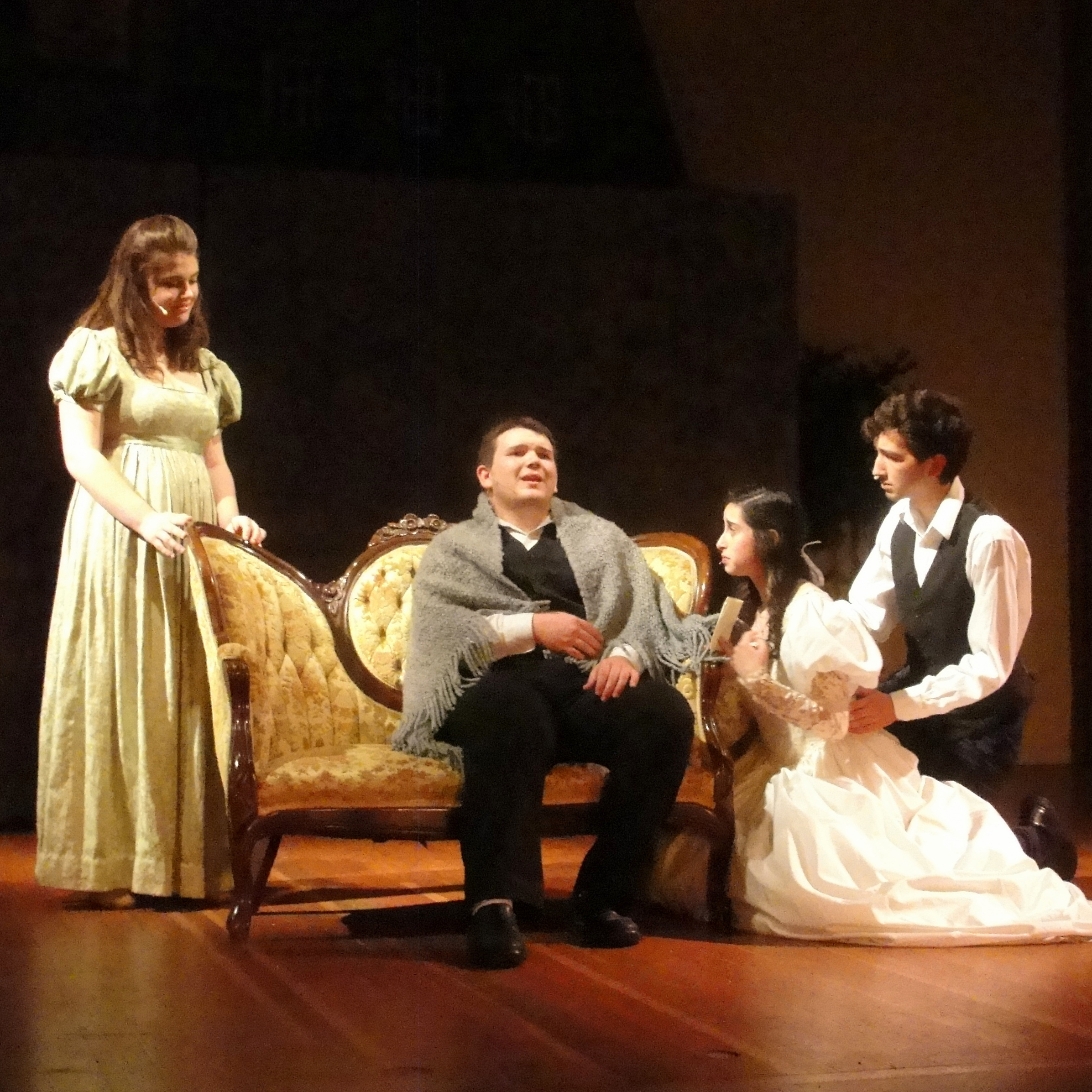 From left to right, Evelyn Utterback, Josh Stover, Sarah Covault, and Zach Macias perform Les Miserables on stage at Poinsettia Pavilion. Credit: Marta Dewey. Used with permission. 