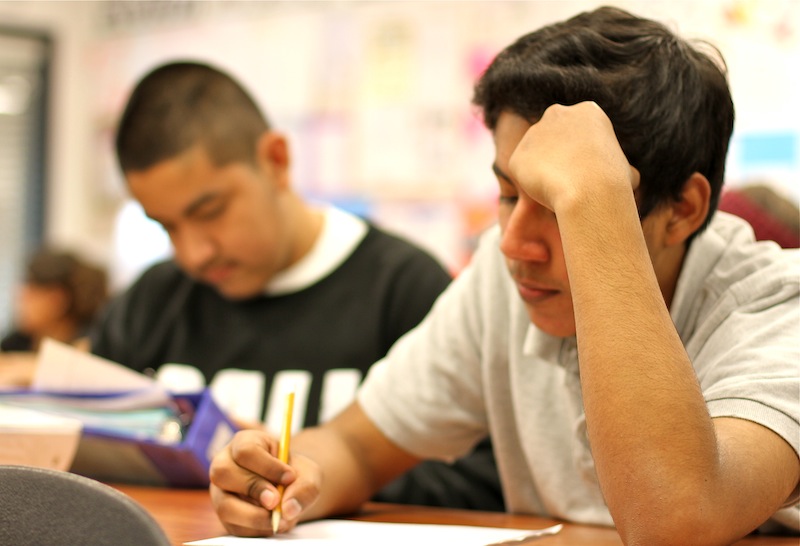 Freshman Jessi Pacheco writes a speech in Richard Geibs seventh period English class. Credit: Jackson Tovar/The Foothill Dragon Press