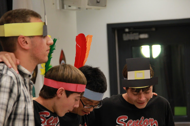 From left, seniors Chris Hanna, Wesley Harris, David Choi, and Ryan Harris participate in the activities at the senior Thanksgiving potluck on Friday. Credit: Josh Ren/The Foothill Dragon Press