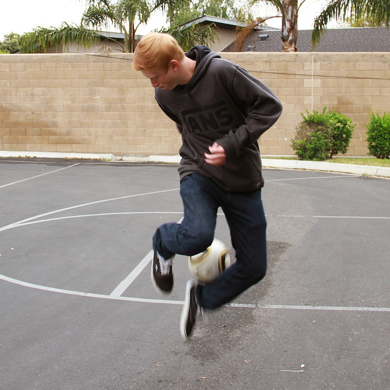 Sophomore Justin Redemann does soccer tricks like jumping with the ball. Credit: Kazu Koba/The Foothill Dragon Press